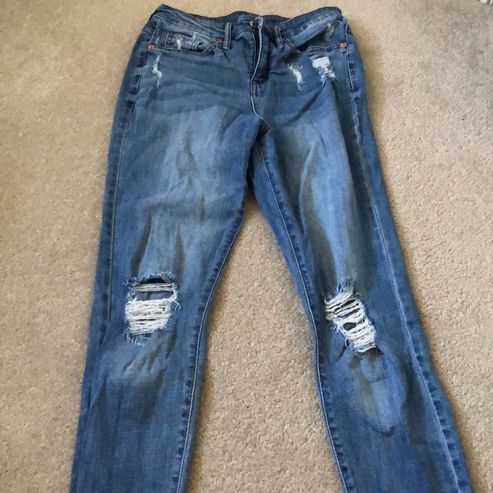 blue ripped denim jeans